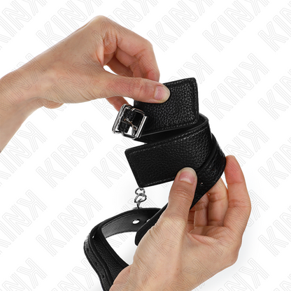 KINK - MUÑECA AJUSTABLE NEGRA CON ESTAMPADO DE COBRA 20-28 CM X 5,4 CM
